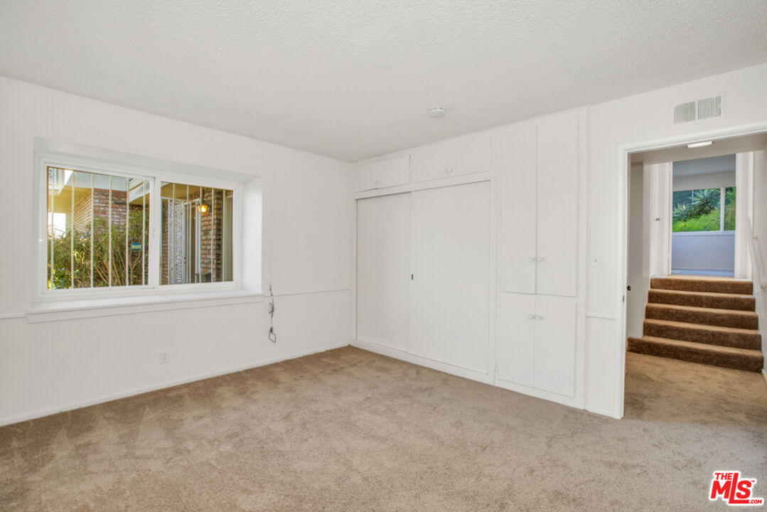 5272 Veronica Street Los Angeles, CA 90008 - Photo 26 of 51 a view of an empty room with a window