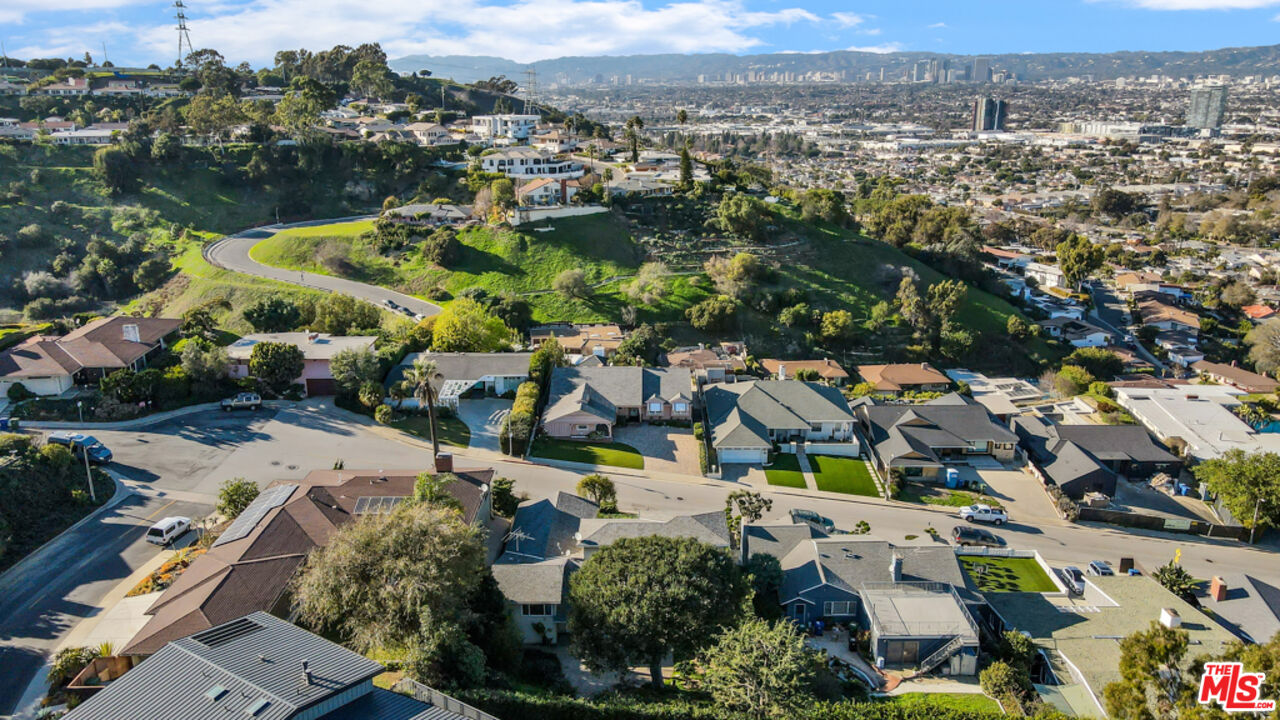 5272 Veronica Street Los Angeles, CA 90008 - Photo 4 of 51 an aerial view of residential houses with outdoor space