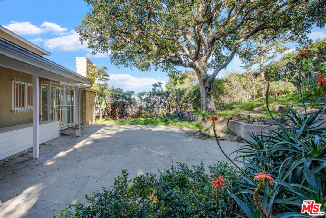 5272 Veronica Street Los Angeles, CA 90008 - Photo 43 of 51 a view of a house with a backyard