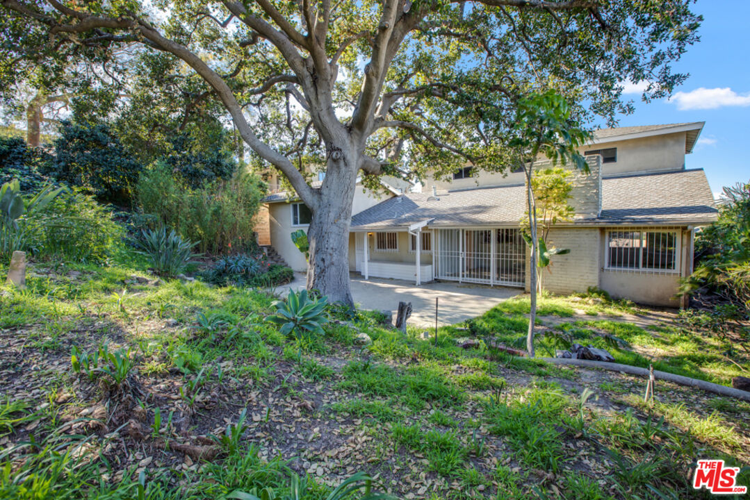 5272 Veronica Street Los Angeles, CA 90008 - Photo 46 of 51 front view of a house with a tree
