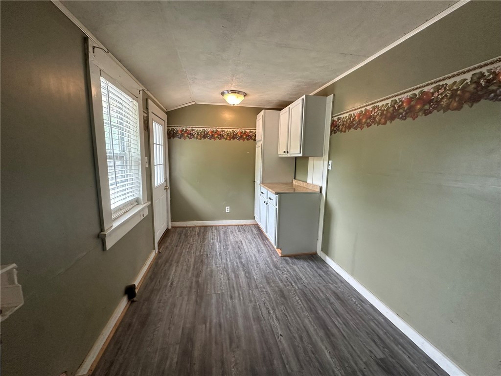 131 Dell Street Portland, TX 78374 - Photo 17 of 40 a view of empty room with wooden floor and fan