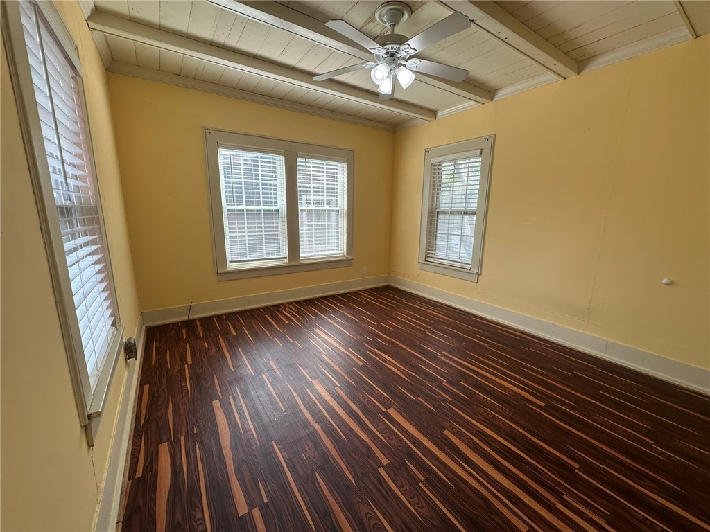 131 Dell Street Portland, TX 78374 - Photo 24 of 40 a view of an empty room with wooden floor and a window