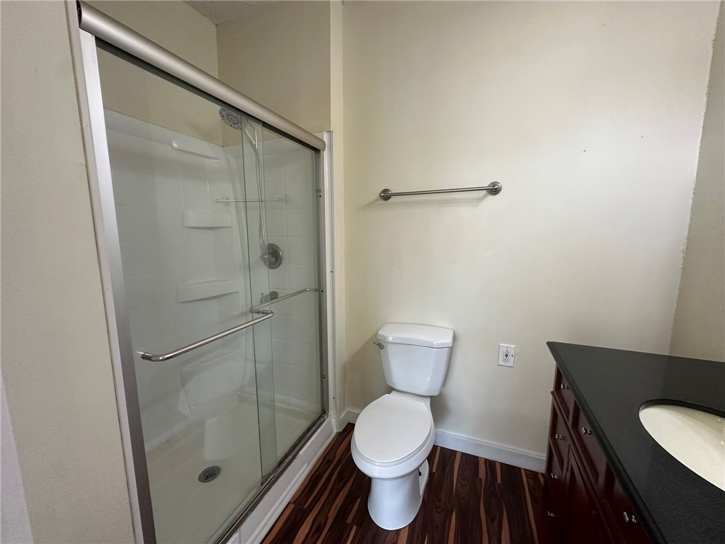 131 Dell Street Portland, TX 78374 - Photo 27 of 40 a bathroom with a toilet and a shower
