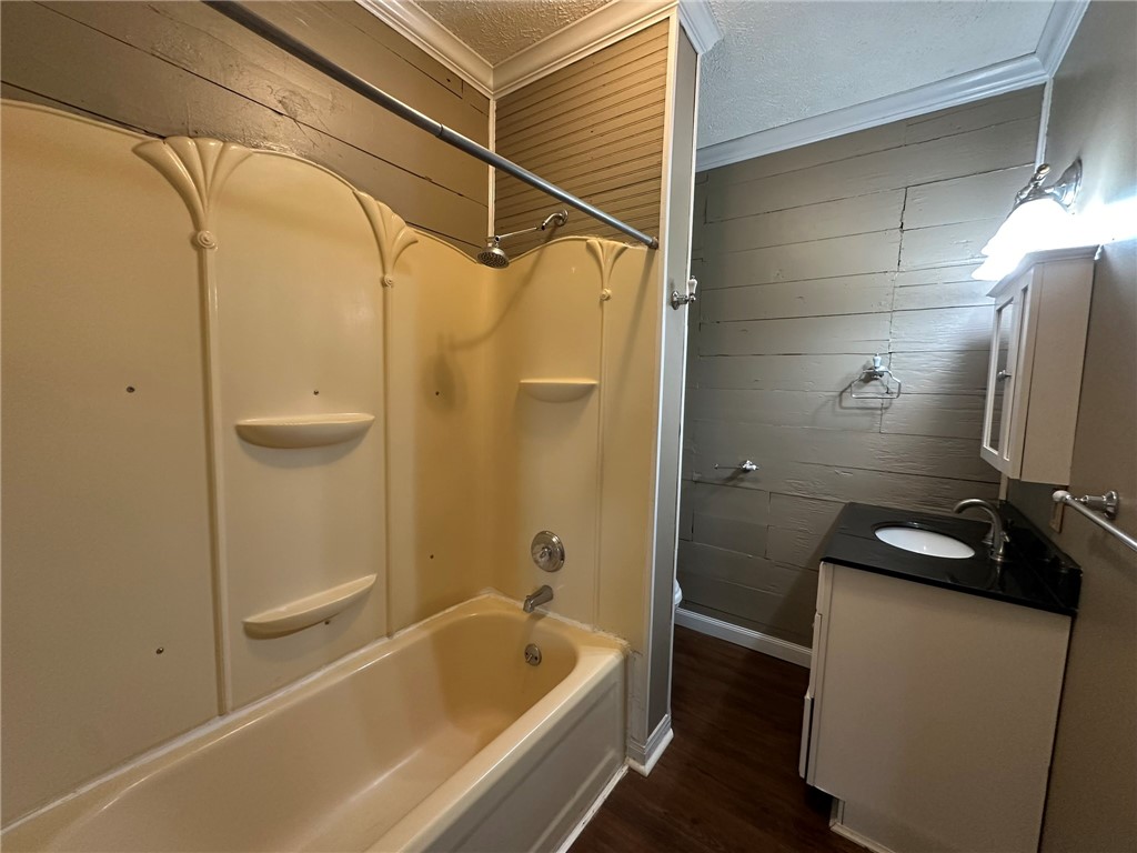 131 Dell Street Portland, TX 78374 - Photo 31 of 40 a bathroom with a tub and a shower