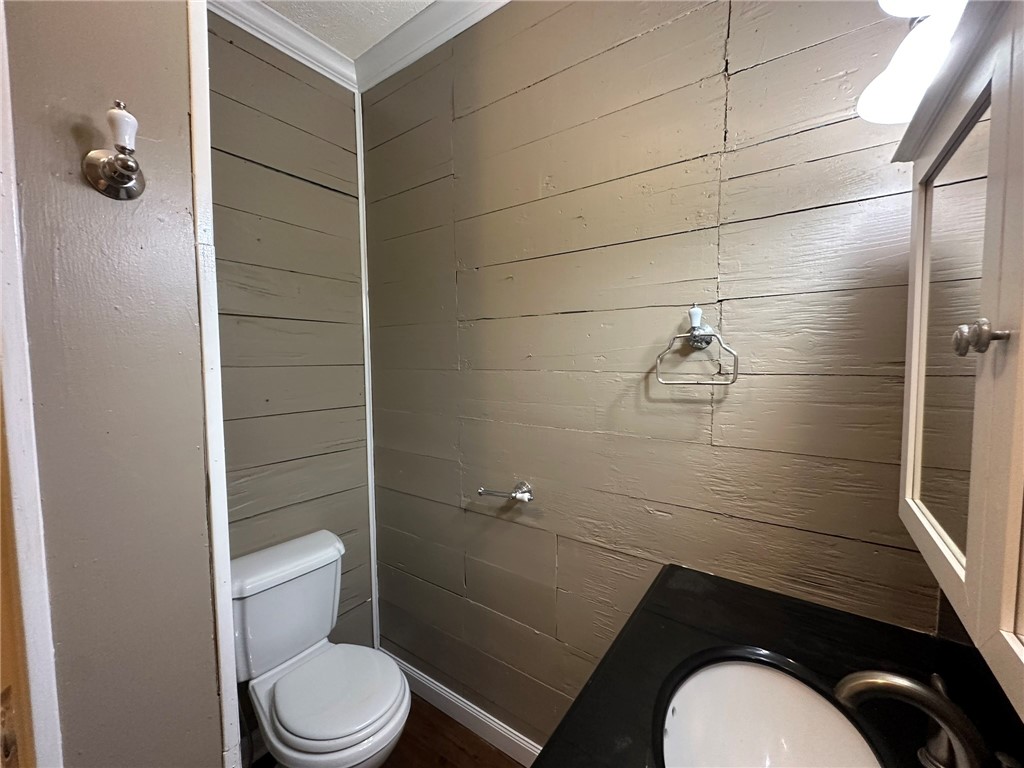 131 Dell Street Portland, TX 78374 - Photo 32 of 40 a bathroom with a toilet and a shower
