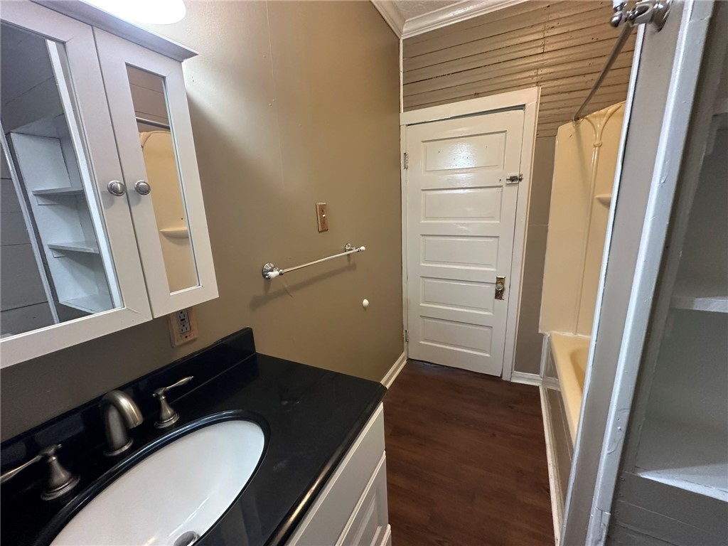 131 Dell Street Portland, TX 78374 - Photo 34 of 40 a bathroom with a granite countertop sink toilet and shower