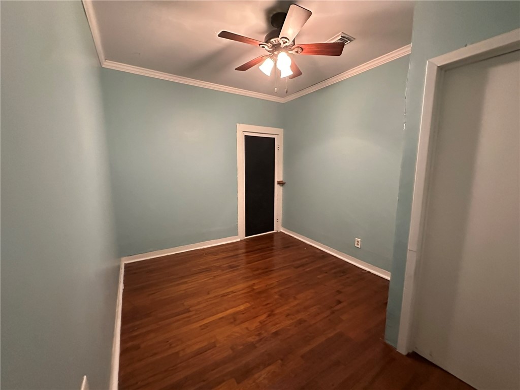 131 Dell Street Portland, TX 78374 - Photo 36 of 40 an empty room with a fan and a ceiling fan