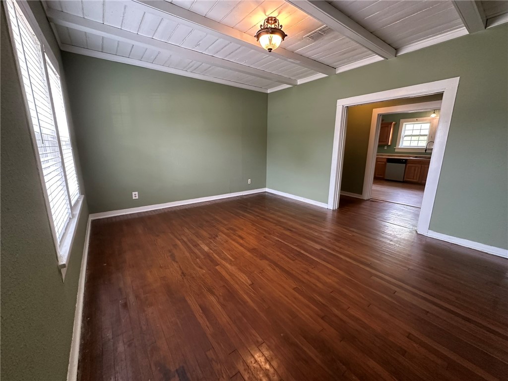 131 Dell Street Portland, TX 78374 - Photo 9 of 40 a view of livingroom with hardwood floor and hallway