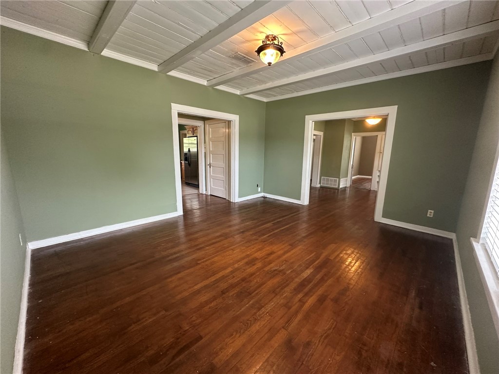 131 Dell Street Portland, TX 78374 - Photo 10 of 40 wooden floor in an empty room with a window