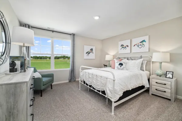 a bed room with a bed and a table