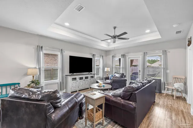 a kitchen with a sink stainless steel appliances and cabinets