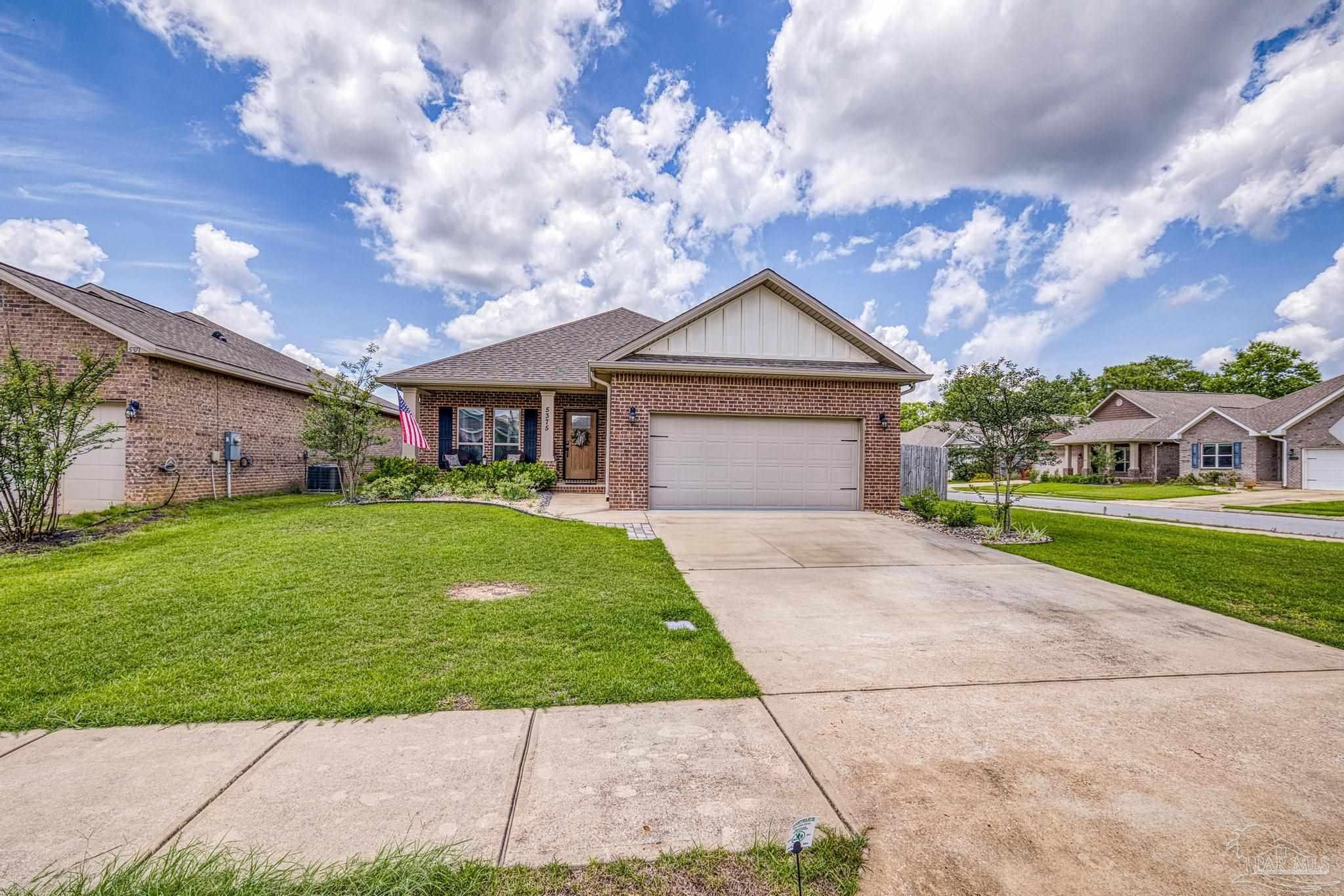 5375 Red Shoulder Road Pace, FL 32571 - Photo 27 of 40 a front view of house with yard