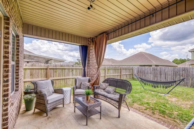 a bench sitting in front of a house