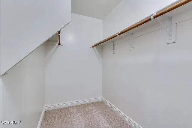 en view of an empty room with a window