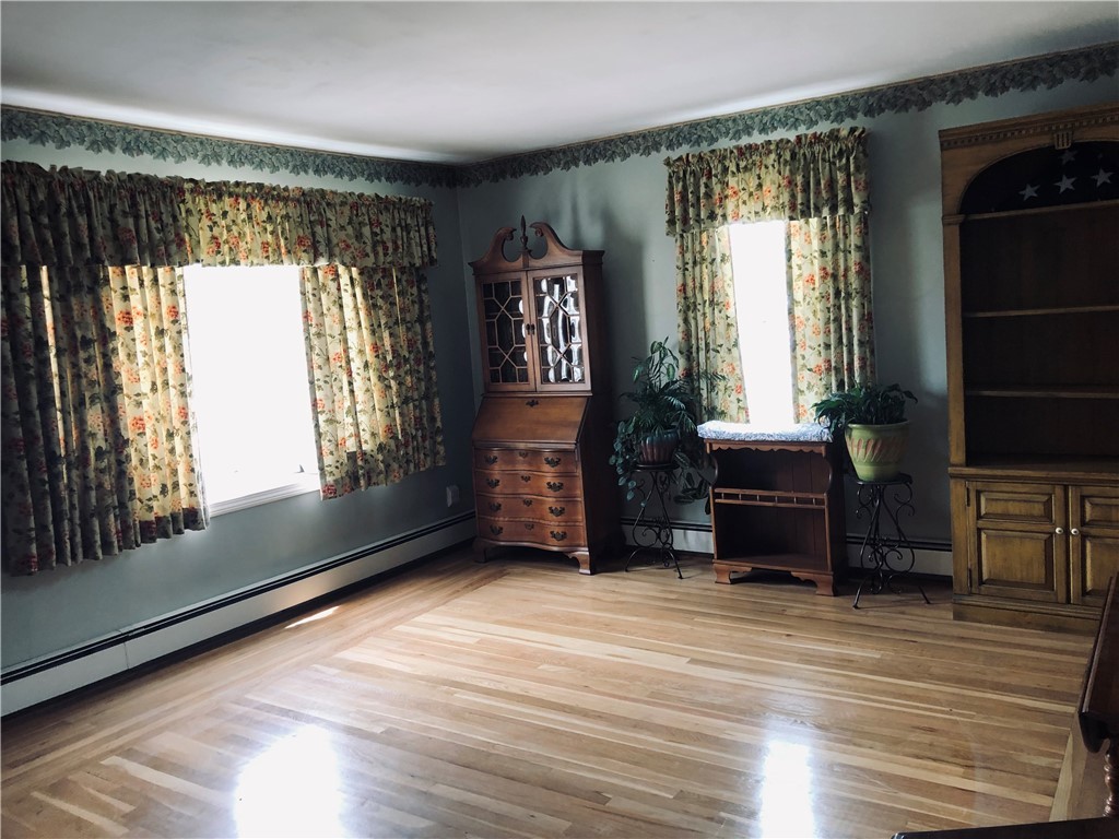 120 Beech Street Woonsocket, RI 02895 - Photo 13 of 37 Beautiful hardwoods throughout the downstairs.