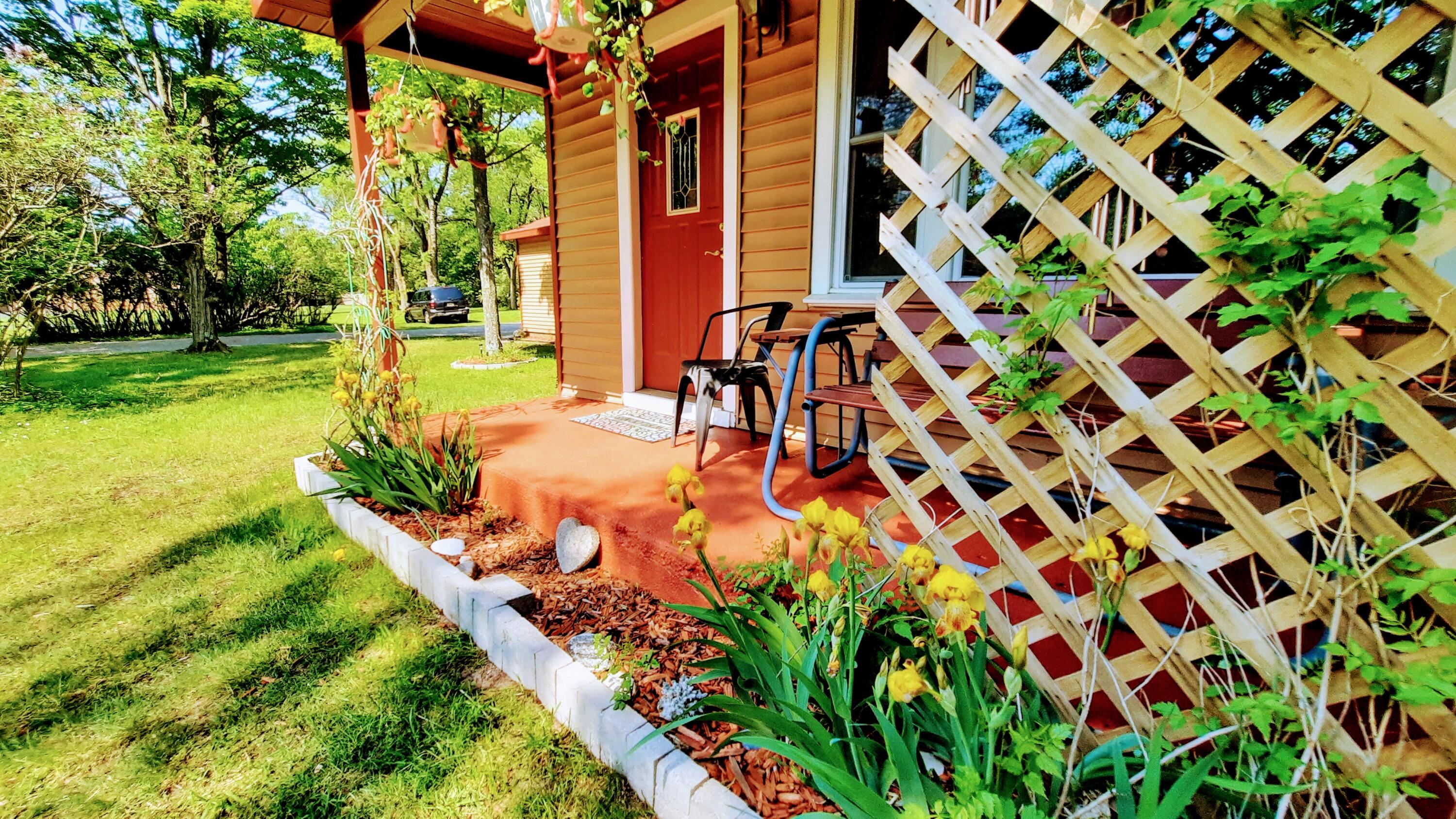 8424 3rd Street Onekama, MI 49675 - Photo 56 of 99 Front Porch Iris