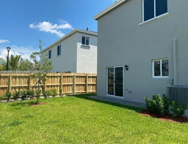 a house view with a garden space