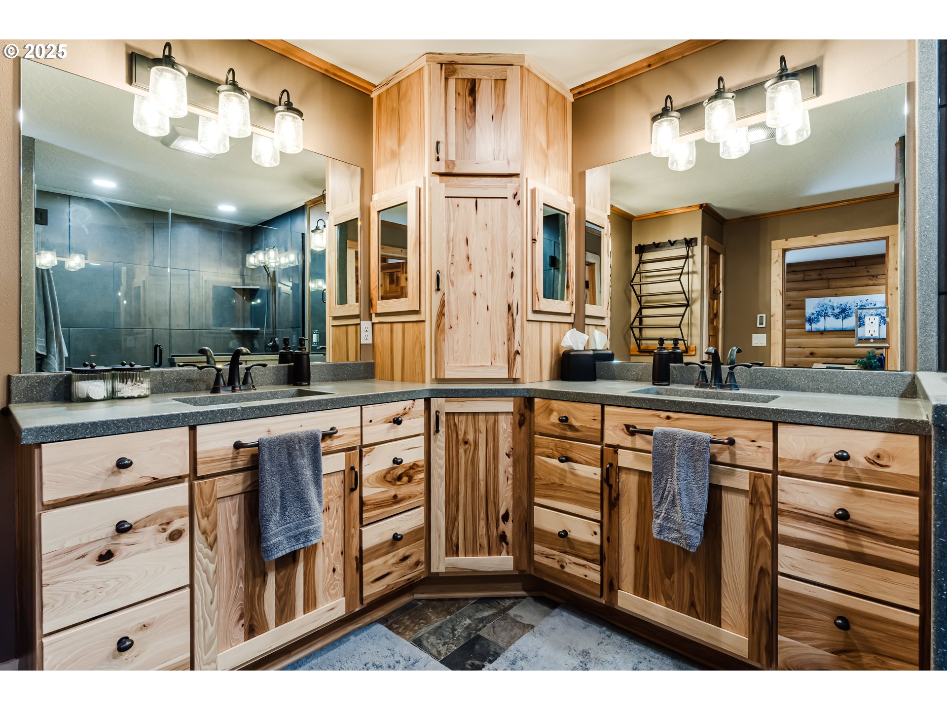 86561 R.R. Baker Road Springfield, OR 97478 - Photo 13 of 47 a bathroom with a sink a vanity and a large mirror