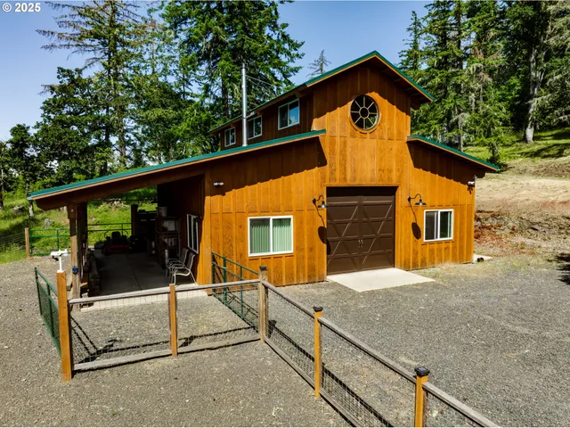 a view of a swimming pool with a patio and wooden floor