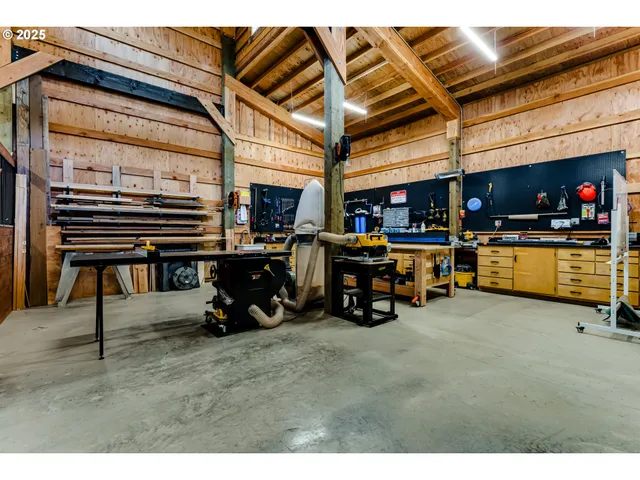 a view of a kitchen with a sink and cabinets