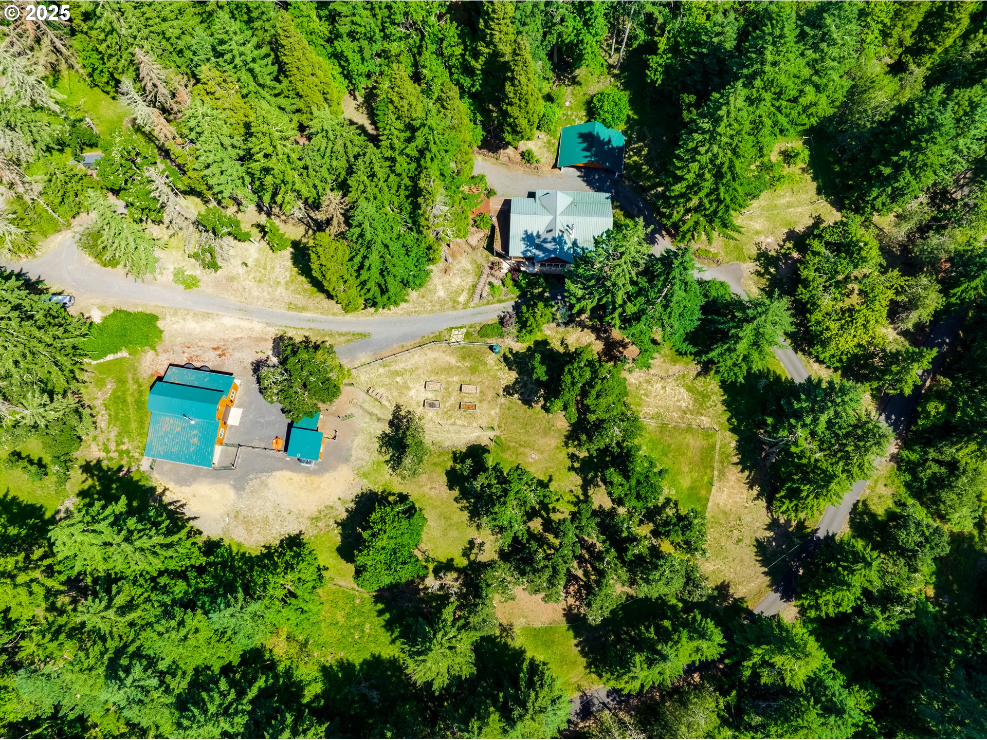 86561 R.R. Baker Road Springfield, OR 97478 - Photo 28 of 47 an aerial view of a house with a yard