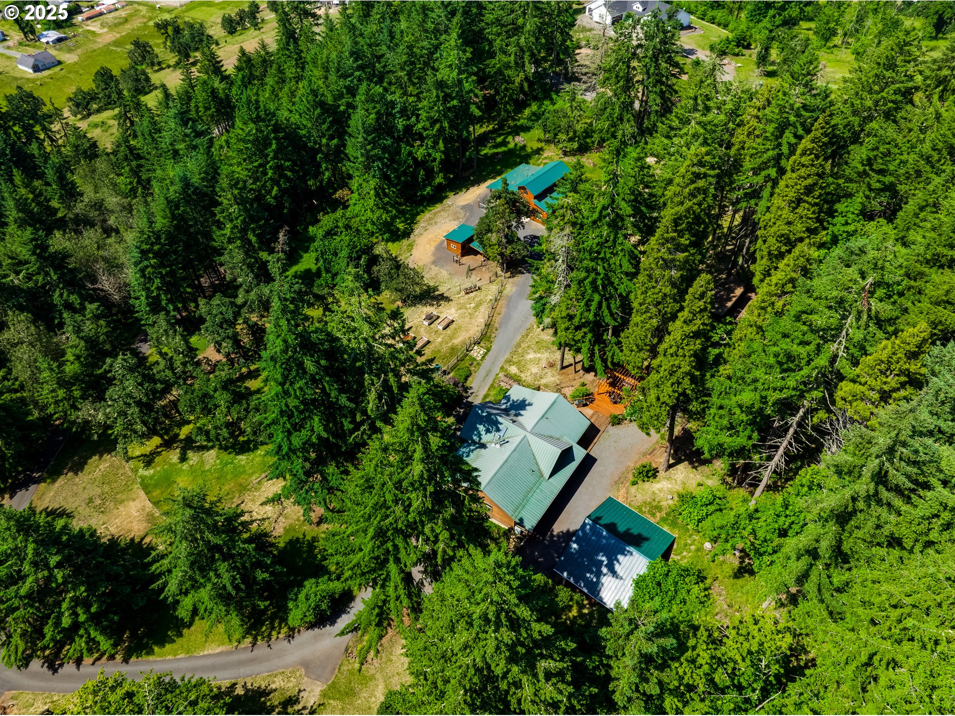 86561 R.R. Baker Road Springfield, OR 97478 - Photo 29 of 47 an aerial view of a house with a yard