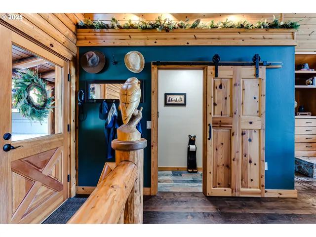 a view of a living room and a wooden floor