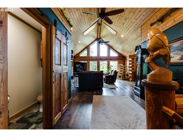 a view of a porch with wooden floor