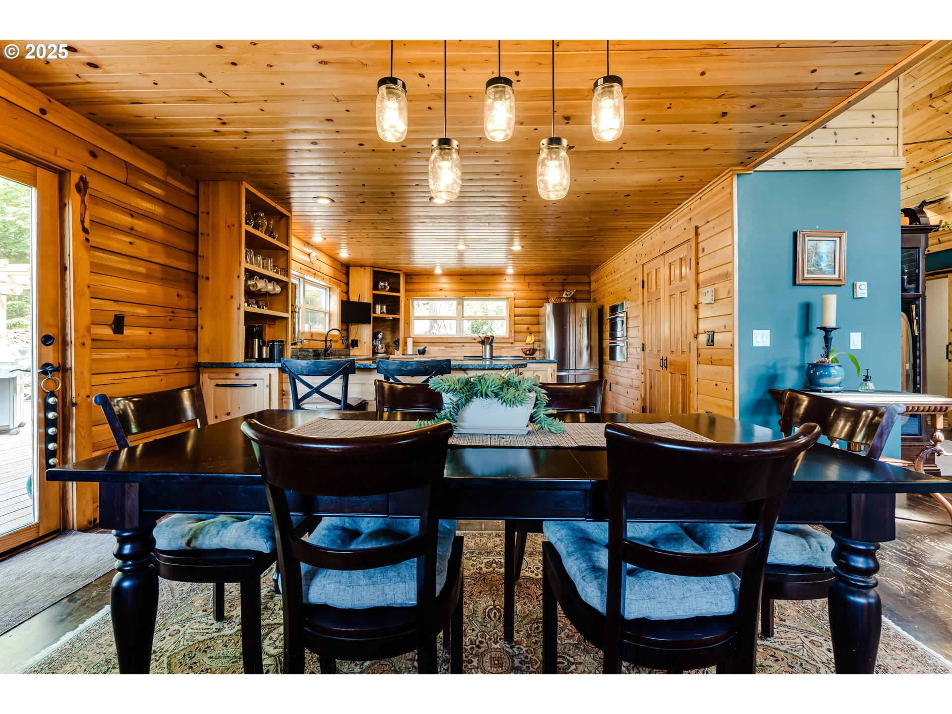 86561 R.R. Baker Road Springfield, OR 97478 - Photo 10 of 47 a dining room with furniture and wooden floor