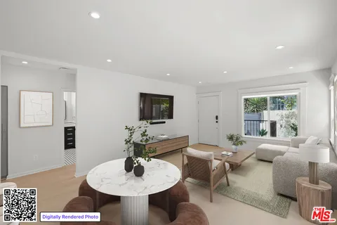 a bed room with a bed and a potted plant