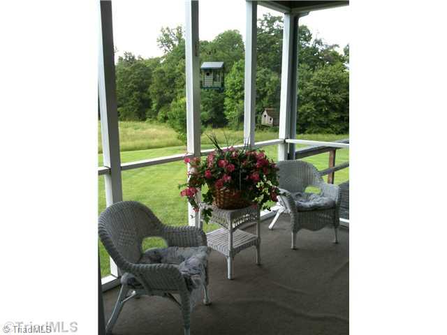 262 Eldora Road Ararat, NC 27007 - Photo 12 of 16 Patio/Deck. Screened in porch