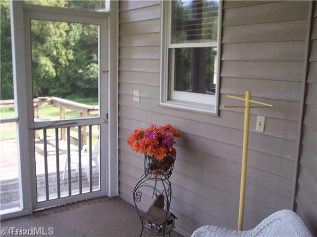 262 Eldora Road Ararat, NC 27007 - Photo 13 of 16 Patio/Deck. screened porch