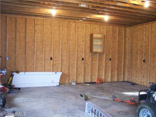 262 Eldora Road Ararat, NC 27007 - Photo 5 of 16 Outbuilding. Inside shop/detached garage