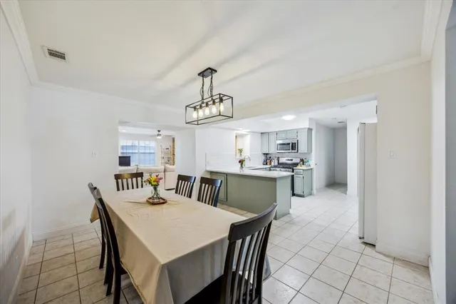 a view of a dining room with furniture