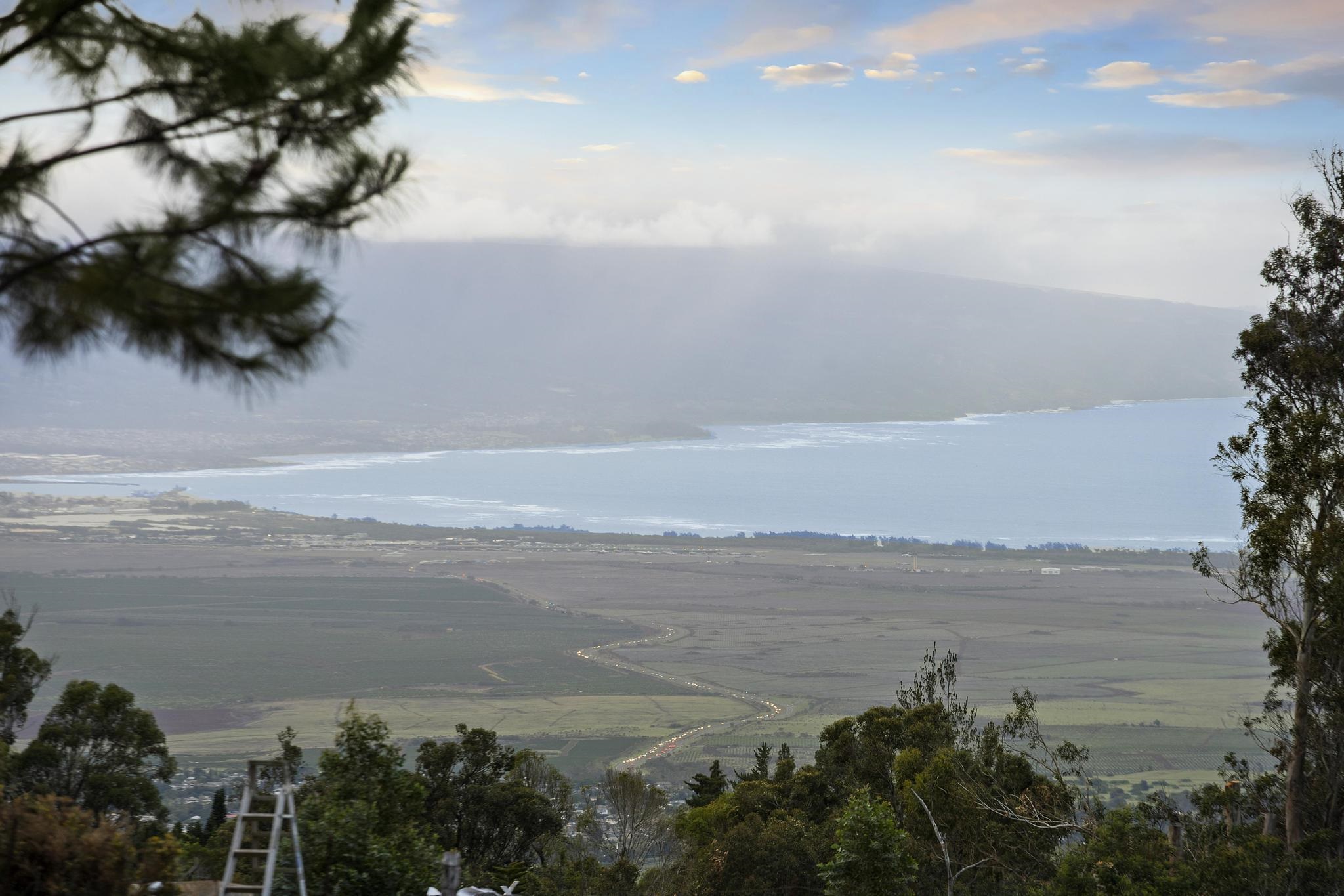 2450 Piiholo Road Makawao, HI 96768 - Photo 3 of 39 a view of lake with mountain