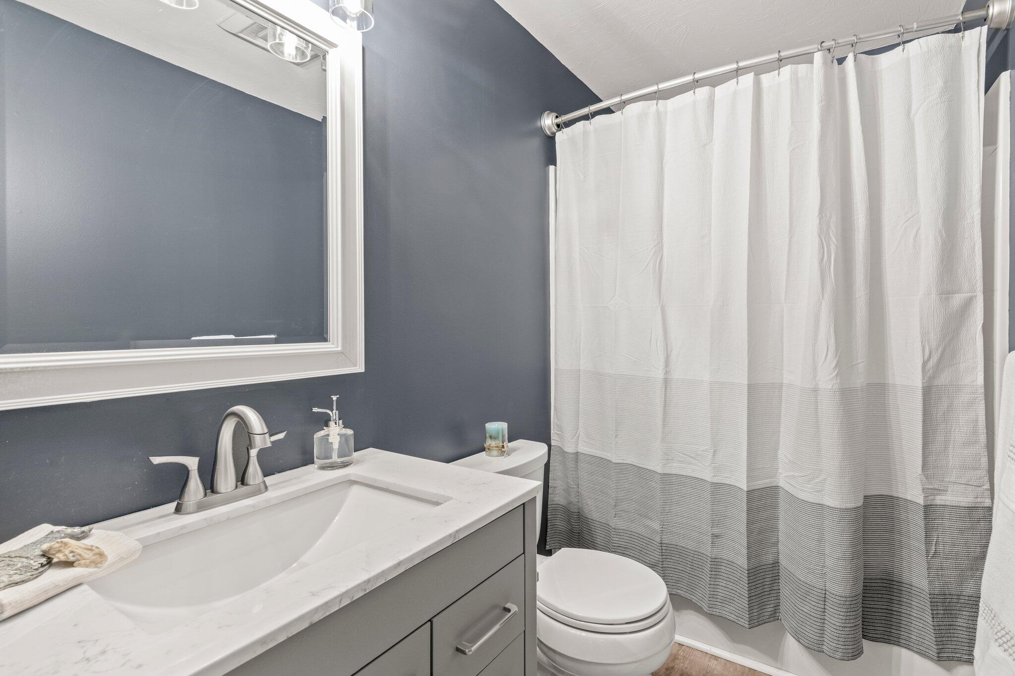 36 Chartwell Drive Buzzards Bay, MA 02532 - Photo 11 of 30 a bathroom with a sink a toilet and shower