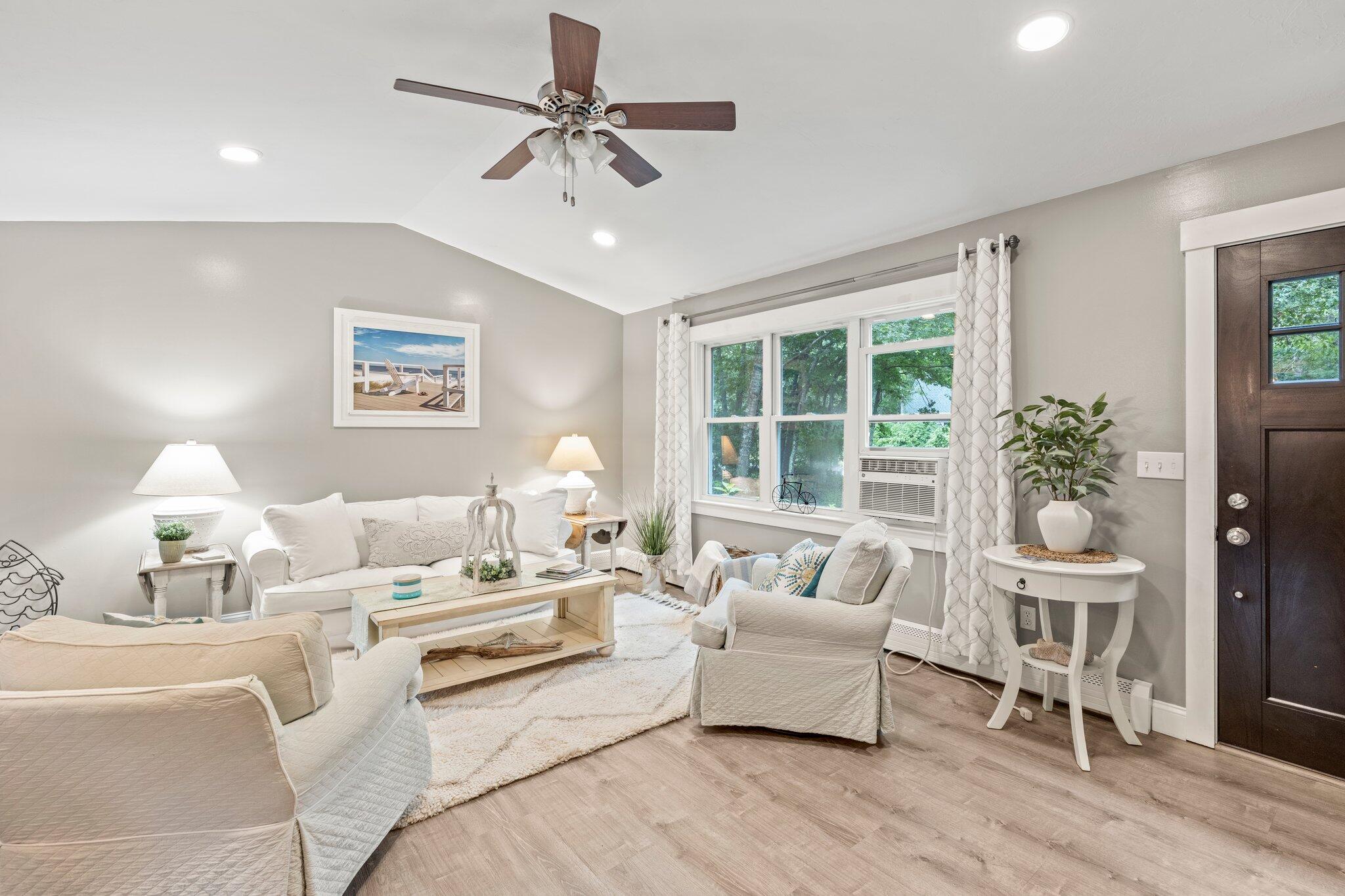 36 Chartwell Drive Buzzards Bay, MA 02532 - Photo 2 of 30 a living room with furniture and a large window