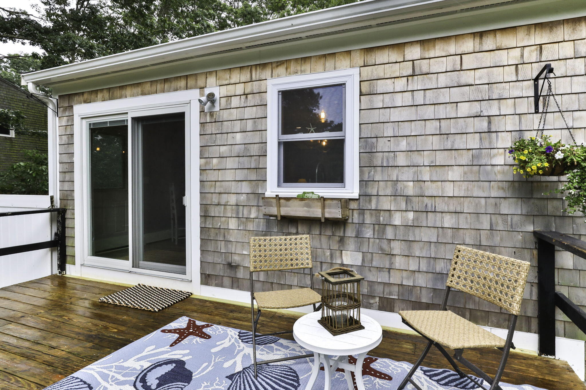 36 Chartwell Drive Buzzards Bay, MA 02532 - Photo 25 of 30 a backyard of a house with seating space