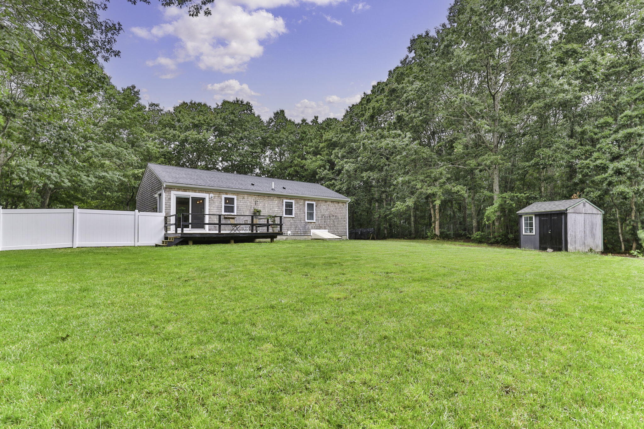 36 Chartwell Drive Buzzards Bay, MA 02532 - Photo 27 of 30 a view of a house with backyard and garden