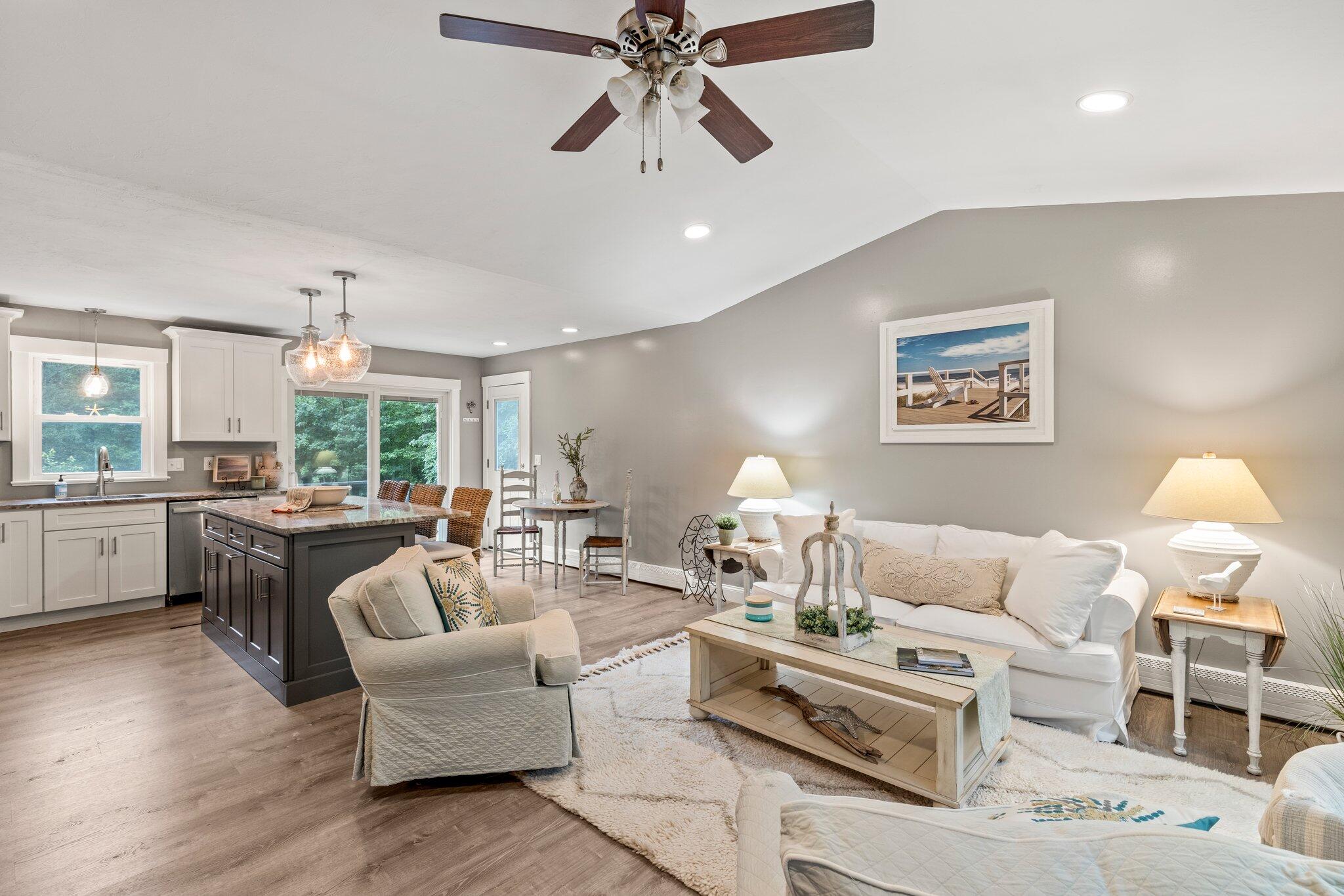36 Chartwell Drive Buzzards Bay, MA 02532 - Photo 5 of 30 a living room with furniture fireplace and window