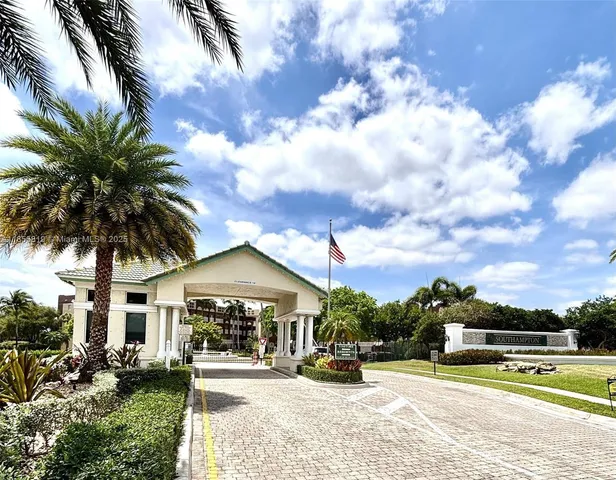 a view of a house with outdoor space and sitting space