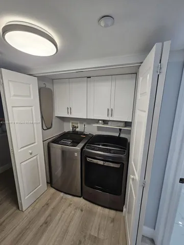 a view of balcony with potted plants