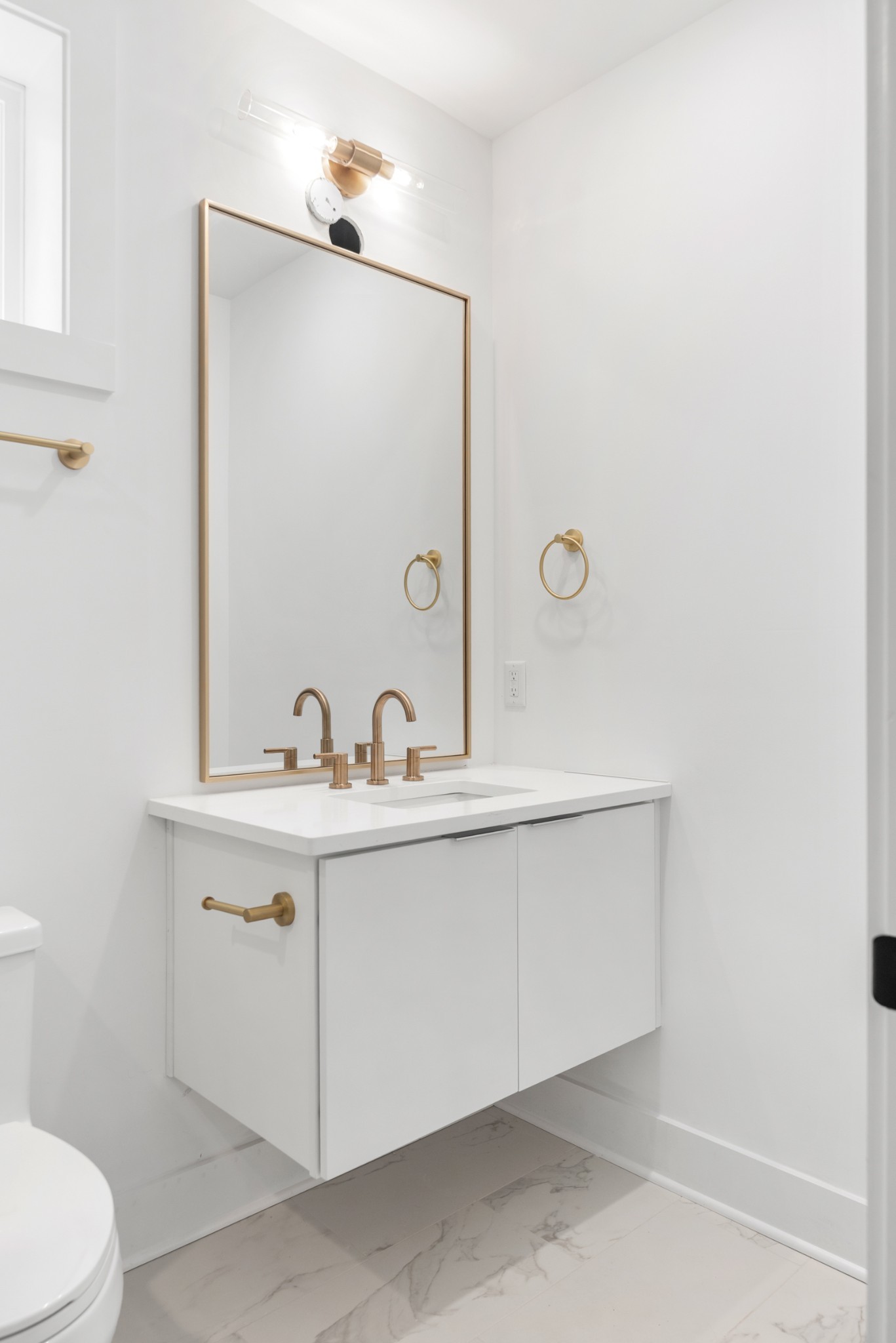 3025 Edwin Street Nashville, TN 37207 - Photo 35 of 48 a bathroom with a sink and a toilet