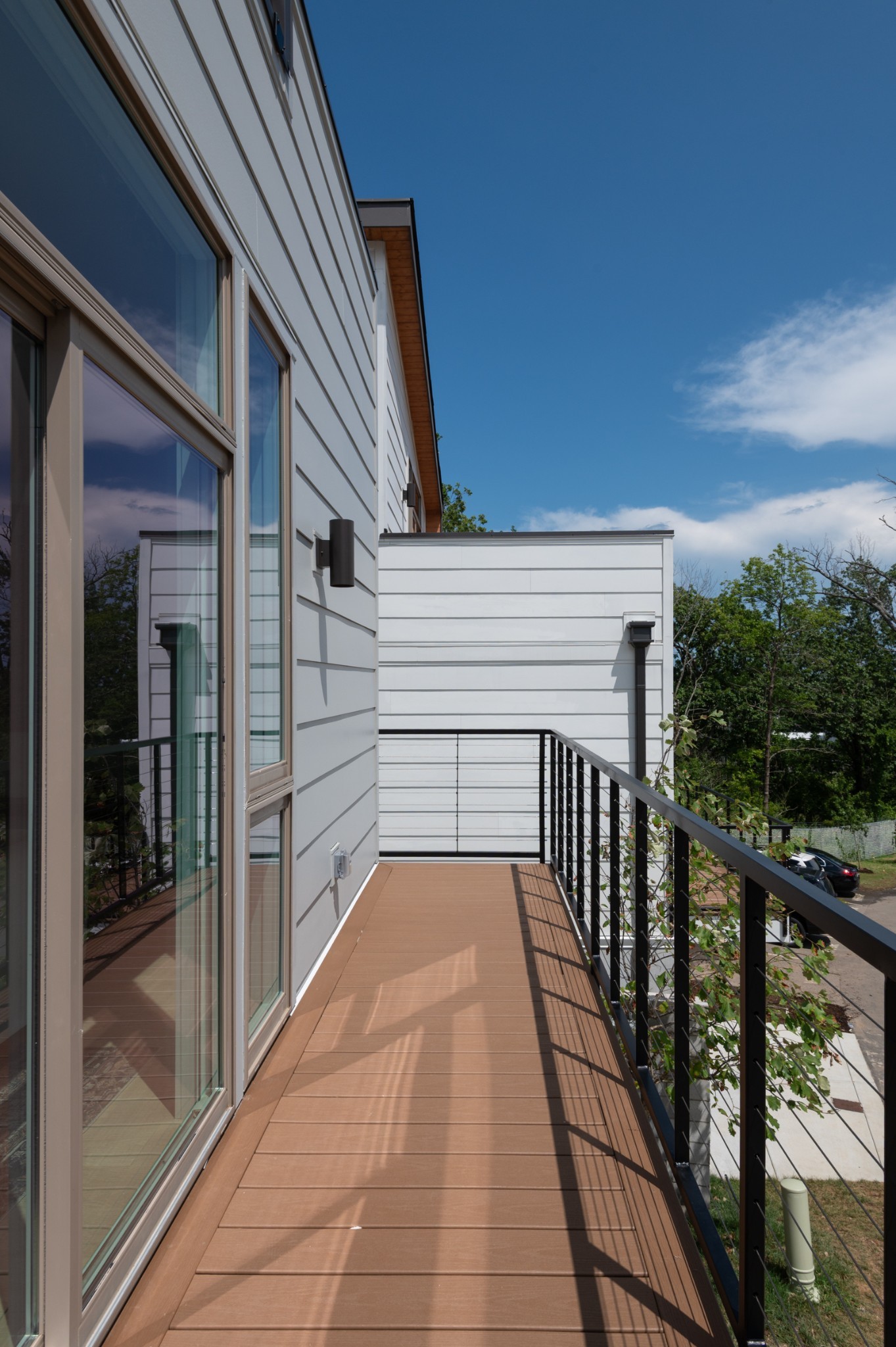 3025 Edwin Street Nashville, TN 37207 - Photo 40 of 48 a view of a balcony with wooden floor and door