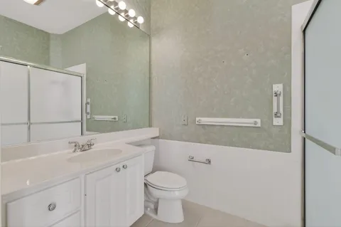 a view of house with yard and entertaining space