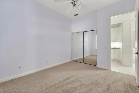 a view of a swimming pool with a lounge chair