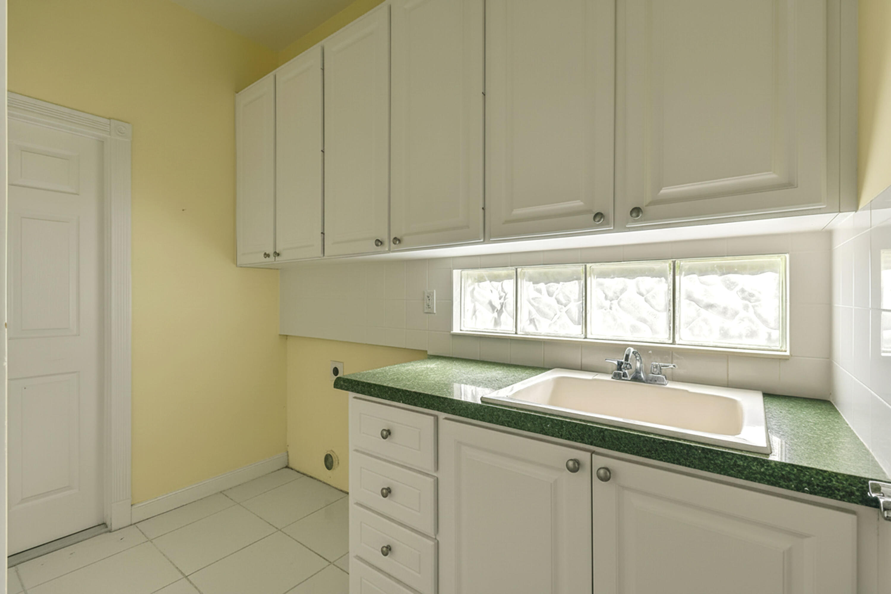 8892 Southeast Eldorado Way Hobe Sound, FL 33455 - Photo 43 of 83 LAUNDRY ROOM