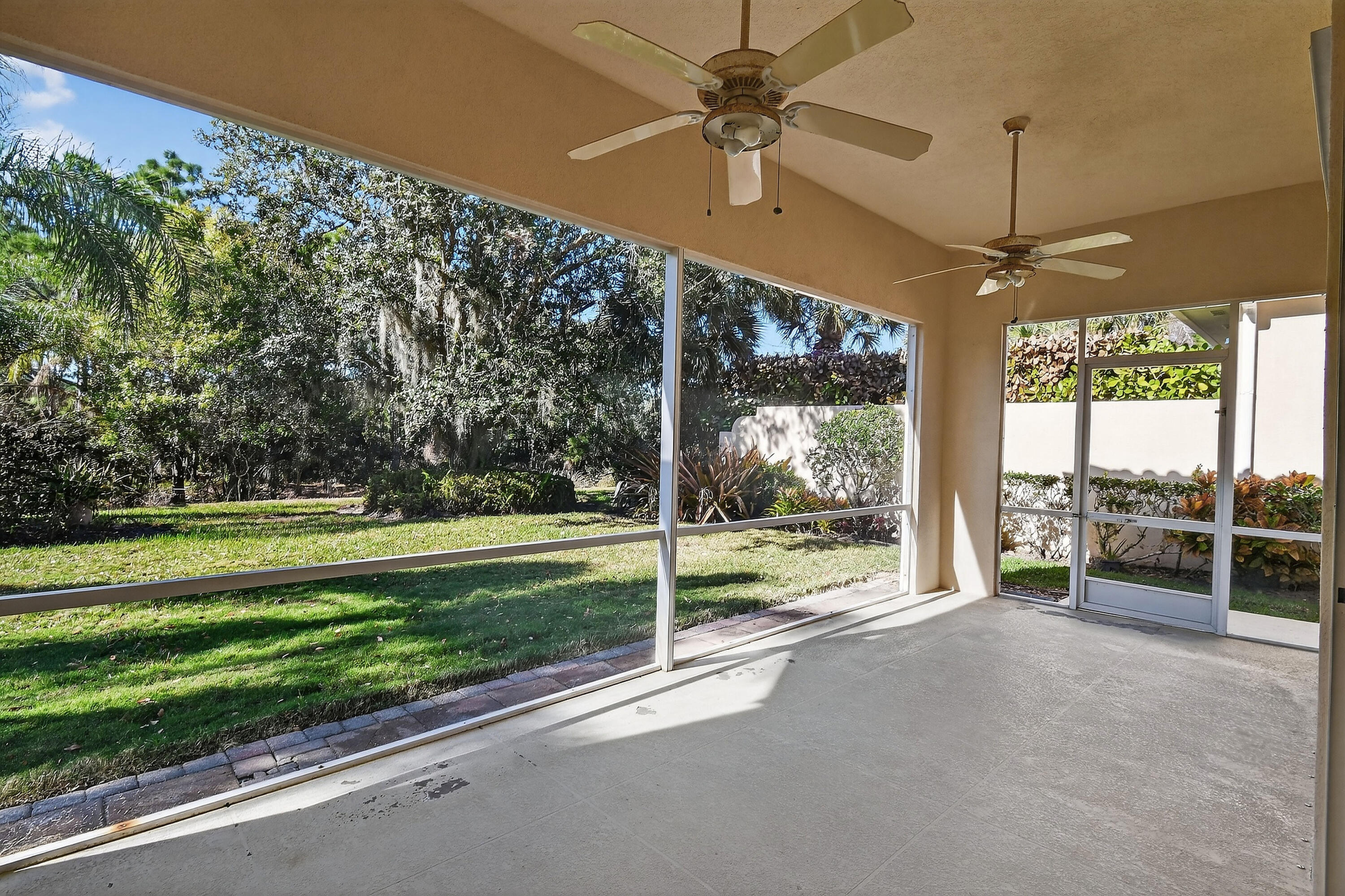 8892 Southeast Eldorado Way Hobe Sound, FL 33455 - Photo 44 of 83 SCREENED-IN BACK PATIO