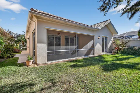 an aerial view of a house with a ocean view