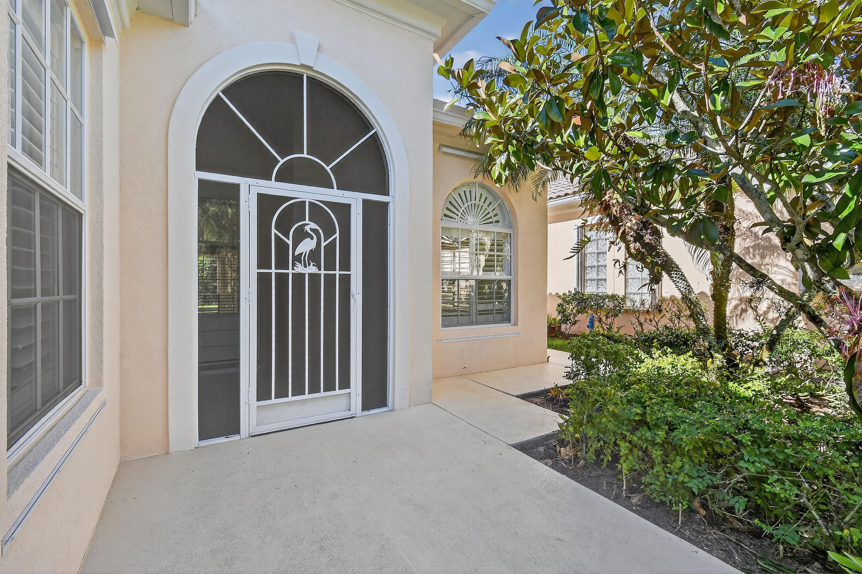8892 Southeast Eldorado Way Hobe Sound, FL 33455 - Photo 5 of 83 SCREENED FRONT ENTRY